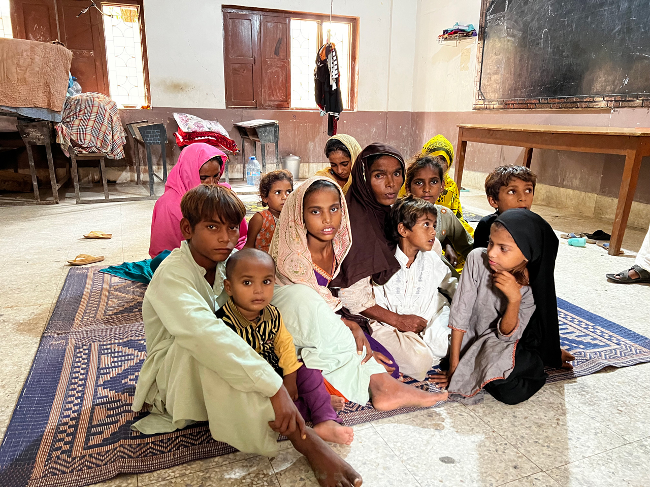 Children shelter from the floods in Karachi, Sindh province, Pakistan